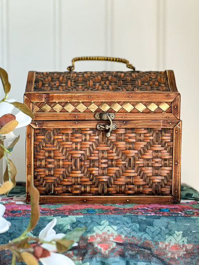 Woven Rattan Chest with Swing Handle and Metal Details Revive In Style Vintage Furniture Painted Refinished Redesign Beautiful One of a Kind Artistic Antique Unique Home Decor Interior Design French Country Shabby Chic Cottage Farmhouse Grandmillenial Coastal Chalk Paint Metallic Glam Eclectic Quality Dovetailed Rustic Furniture Painter Pinterest Bedroom Living Room Entryway Kitchen Home Trends House Styles Decorating ideas
